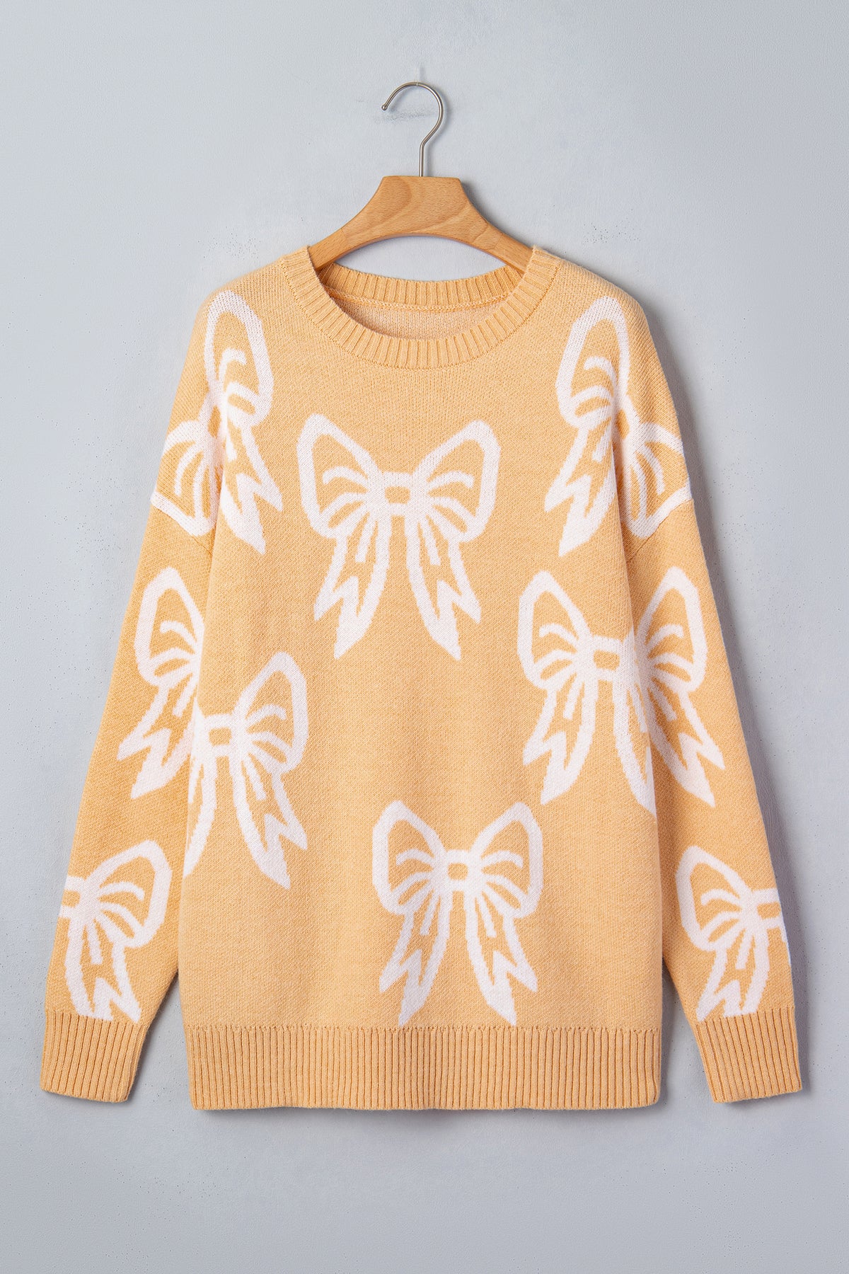 Golden Fleece Bow Pattern Drop Shoulder Loose Sweater
