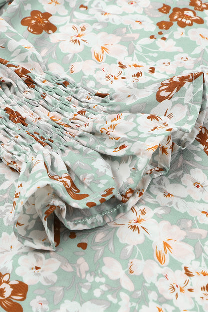 Blusa con botones y cuello en V con estampado floral 