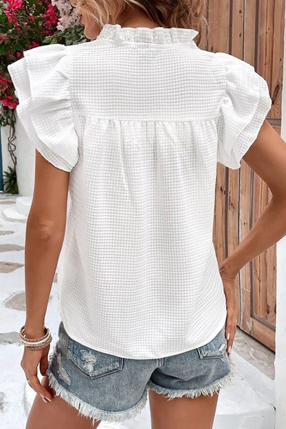 Top con cuello de muesca y manga acampanada con detalle de volantes