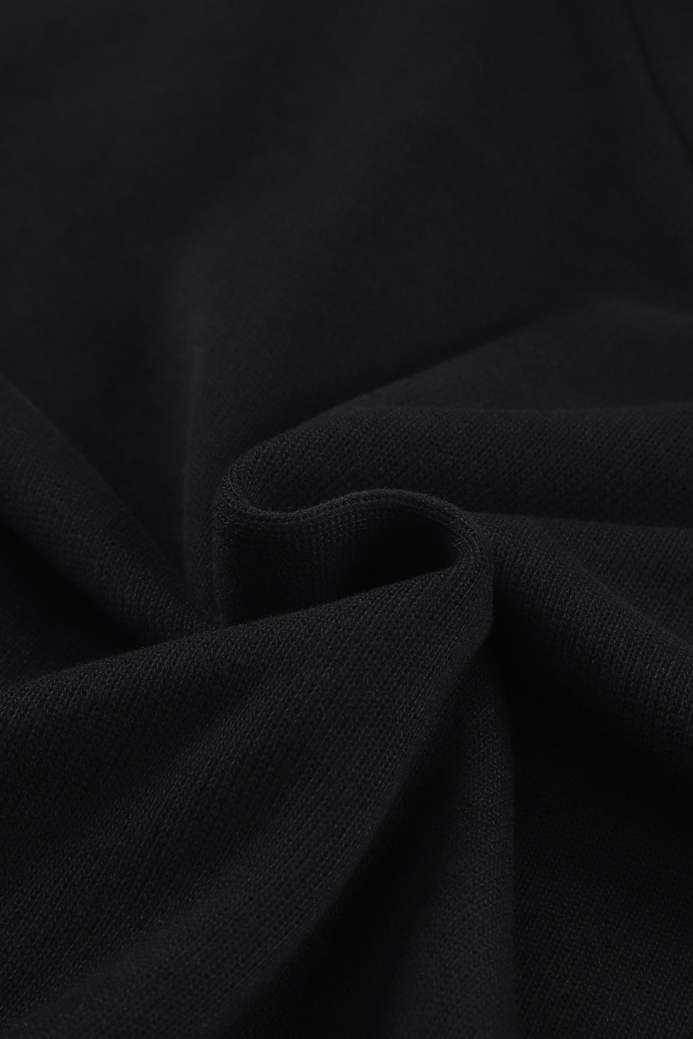 Pull violet en tricot à col en V et poignets boutonnés