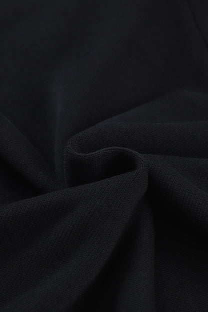 Pull violet en tricot à col en V et poignets boutonnés