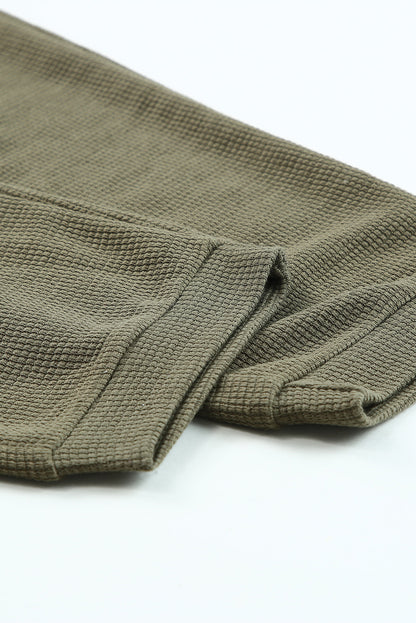 Mono casual texturizado sin mangas con cuello en V y bolsillos