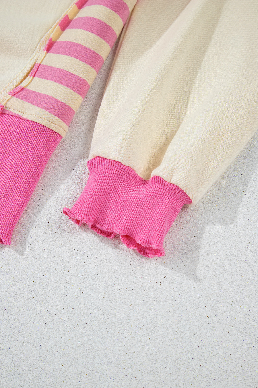 Haut en maille French Terry à rayures roses et blocs de couleurs