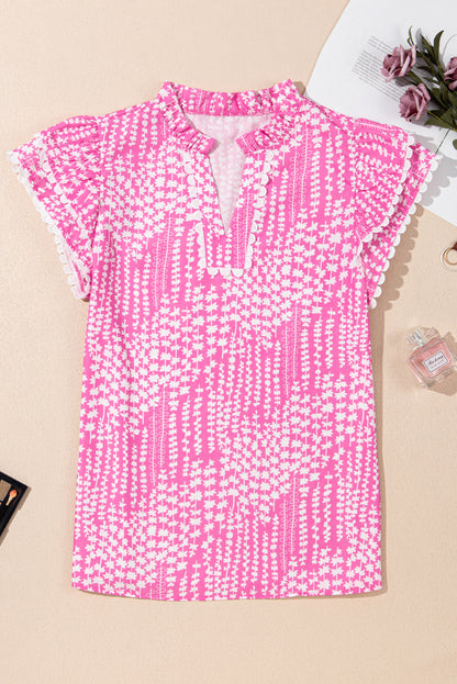 Chemisier rose à imprimé abstrait et bordure Ric Rac, manches flottantes, col en V cranté