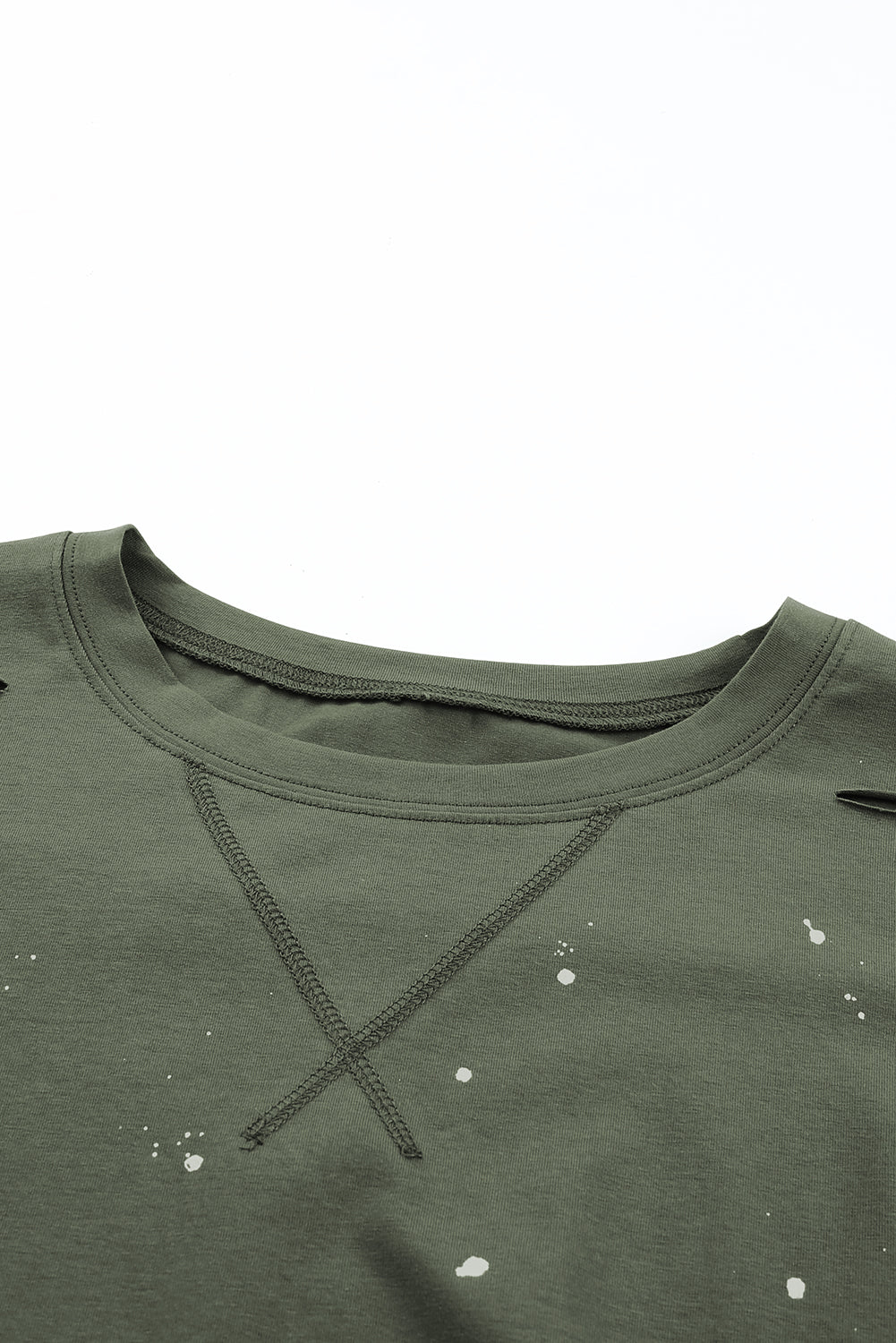 Haut à manches courtes et ourlet asymétrique délavé et vieilli