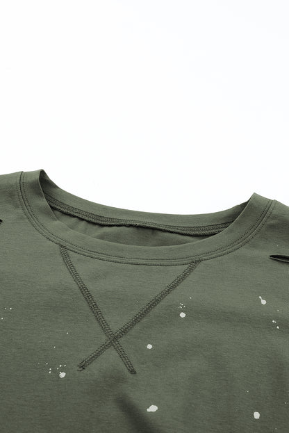 Haut à manches courtes et ourlet asymétrique délavé et vieilli