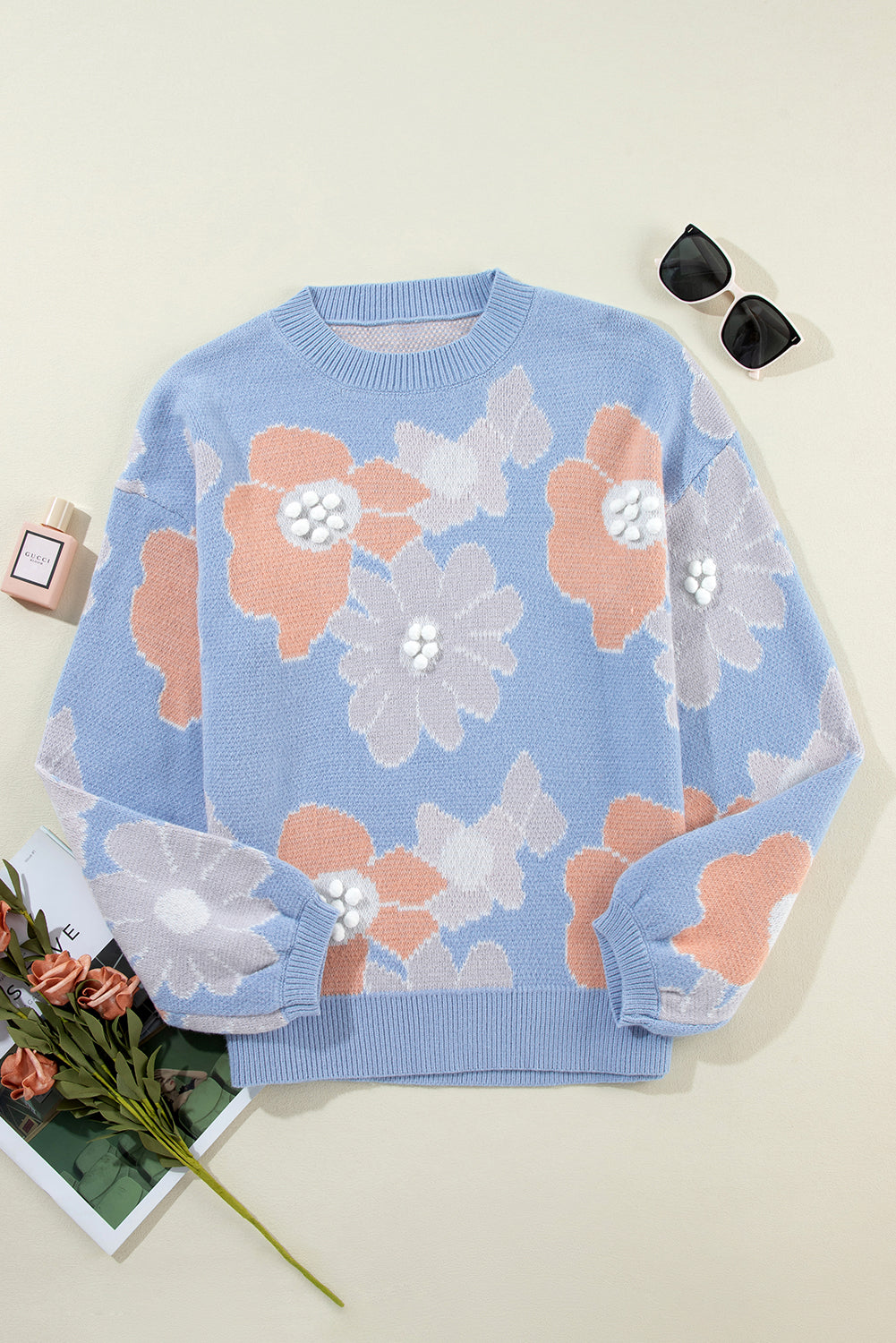 Pull tricoté à col rond et épaules tombantes à motif floral bleu Beau