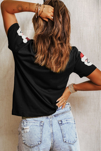 T-shirt noir à paillettes avec motif Père Noël
