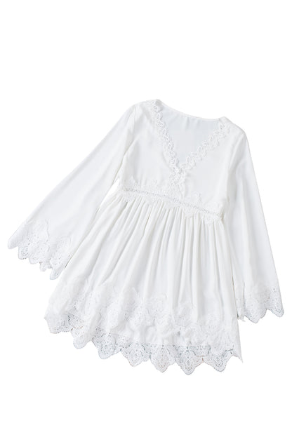 Chemisier à manches cloche et empiècements en crochet