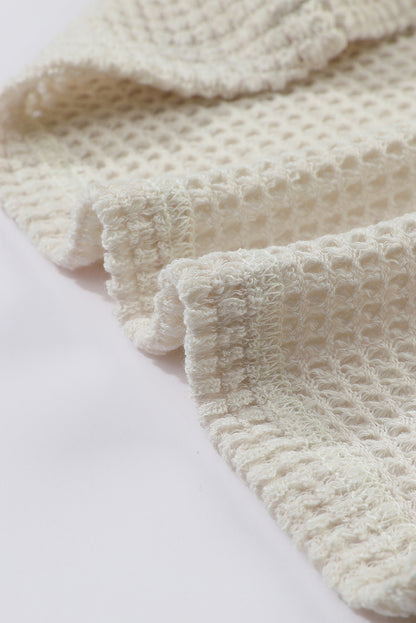 Haut en maille gaufrée beige à manches bouffantes et imprimé tournesol 