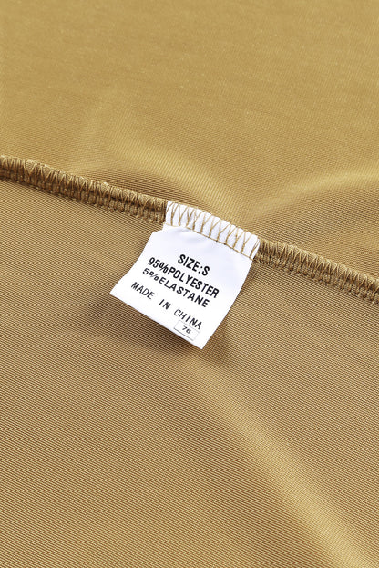 Manteau long en velours jaune avec poches ouvertes sur le devant