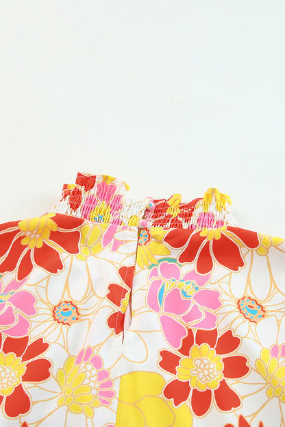 Top floral con mangas acampanadas y cuello levantado multicolor