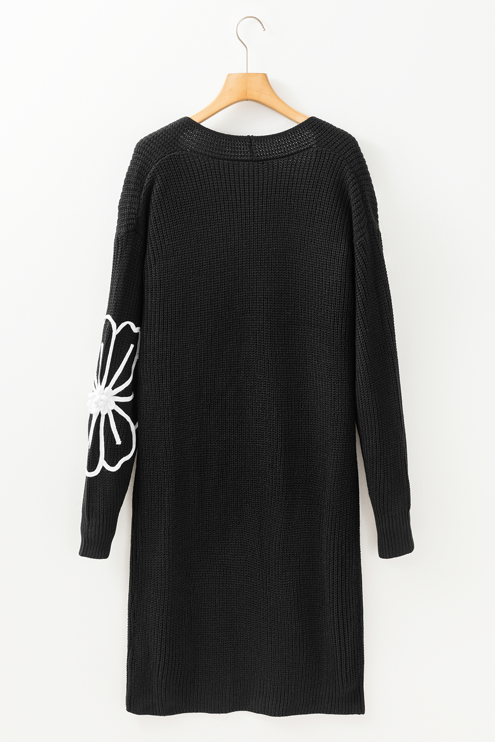 Cardigan ouvert sur le devant à épaules tombantes et broderies de fleurs noires