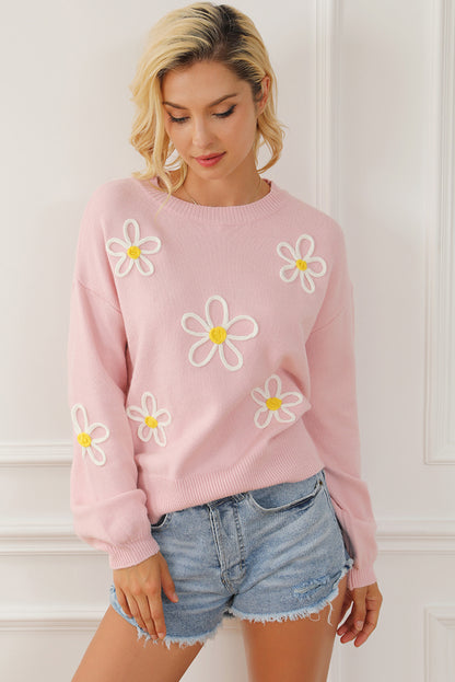 Pull ras du cou rose en chenille avec coutures marguerites 