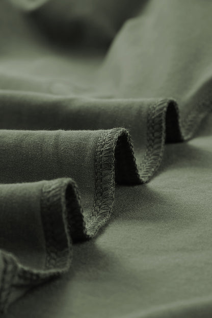 Haut à manches courtes et ourlet asymétrique délavé et vieilli