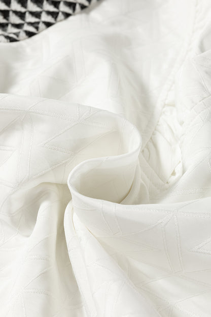 White Geometric Textured Short Sleeve Frilly V Neck Blouse