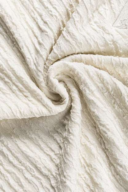 T-shirt kaki pâle texturé à manches larges et col en V