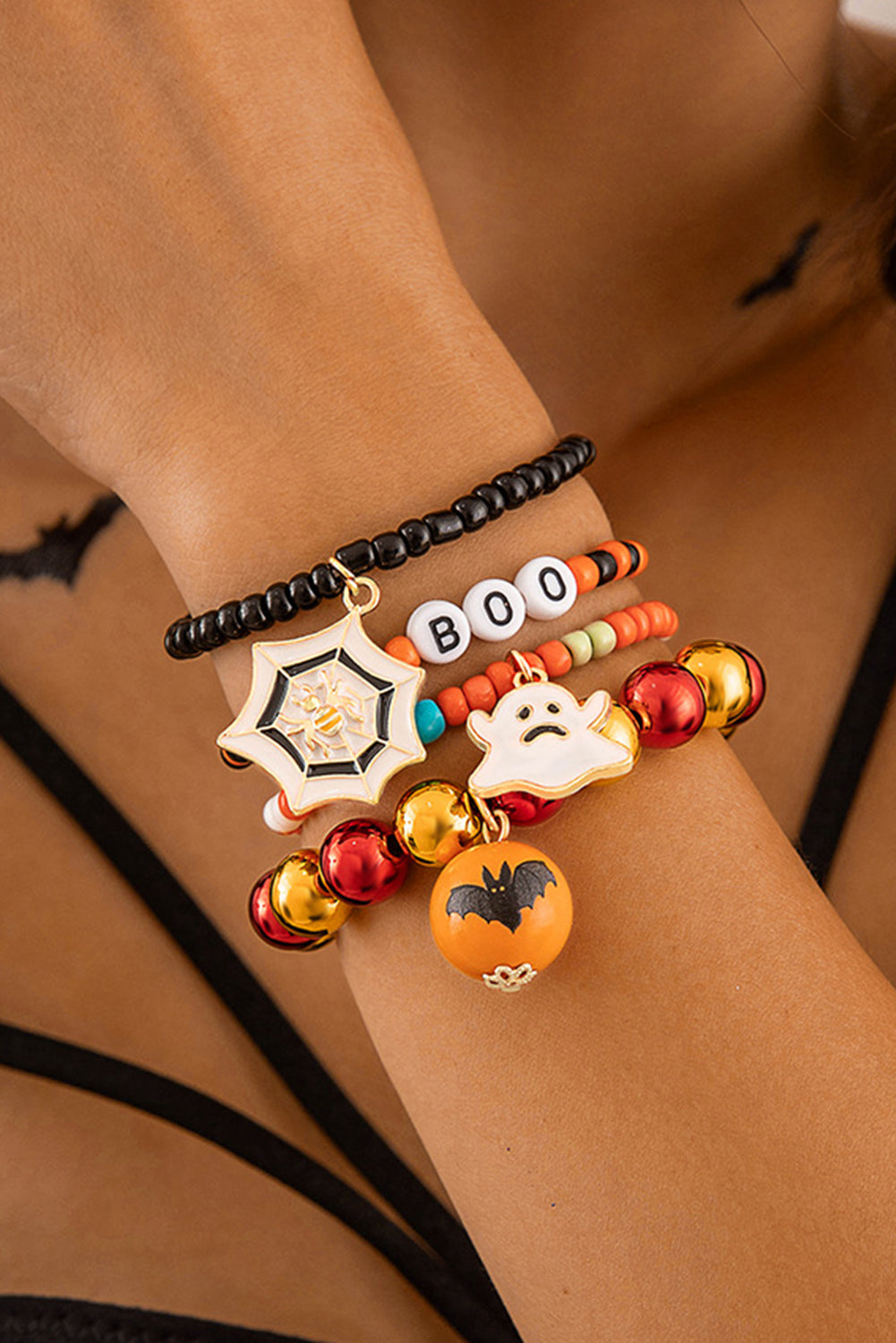 Ensemble de 4 bracelets orange en perles avec toile d'araignée fantôme d'Halloween