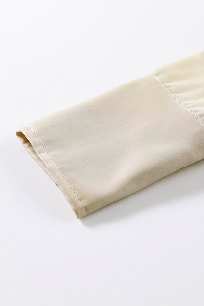 Blusa elegante de manga larga con cuello vuelto negro