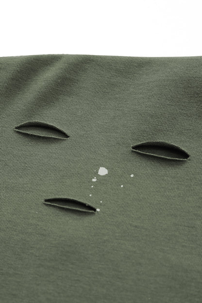 Haut à manches courtes et ourlet asymétrique délavé et vieilli