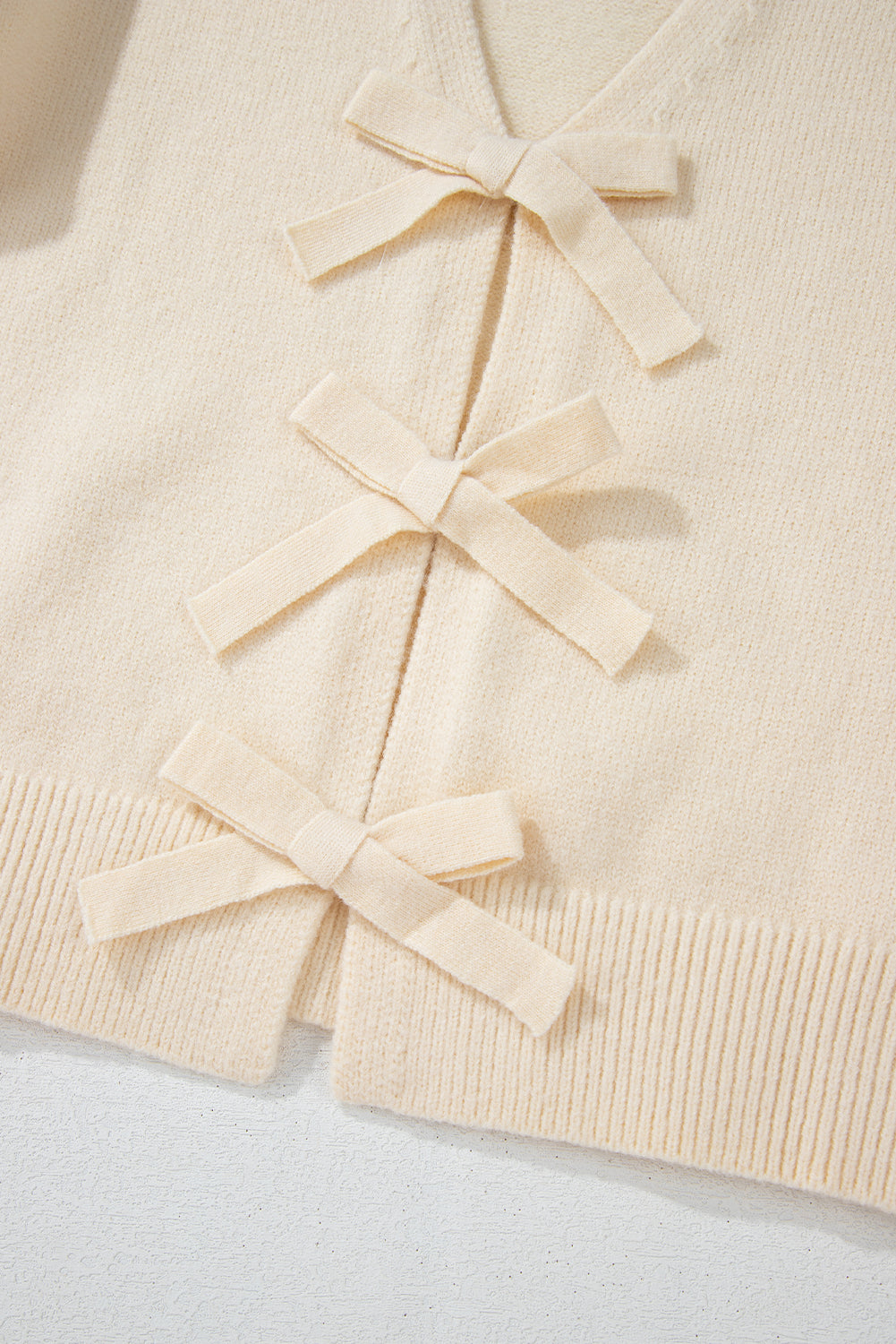 Cardigan en maille ample à col en V et nœud papillon sur le devant Jet Stream