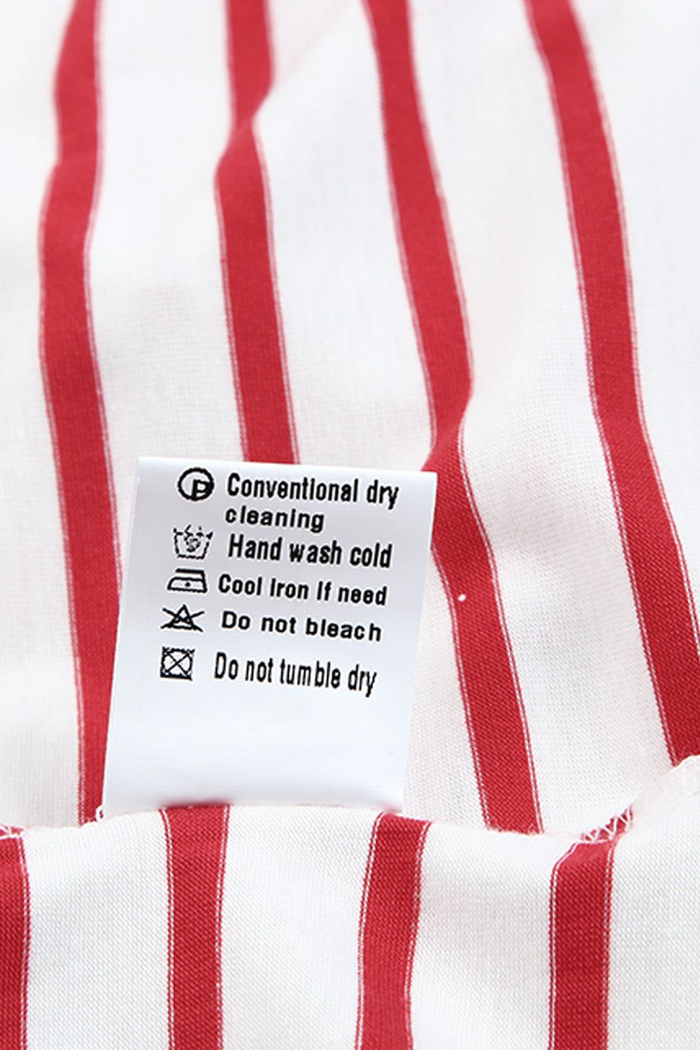 Haut à manches longues boutonné à volants et imprimé rayé