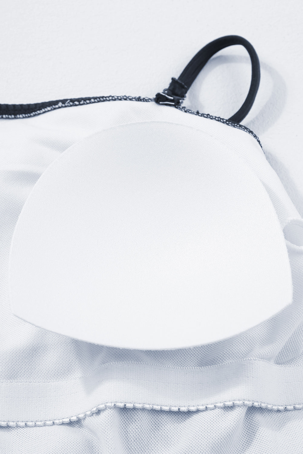 Maillot de bain une pièce bleu marine côtelé avec cordon de serrage et découpes sur les côtés