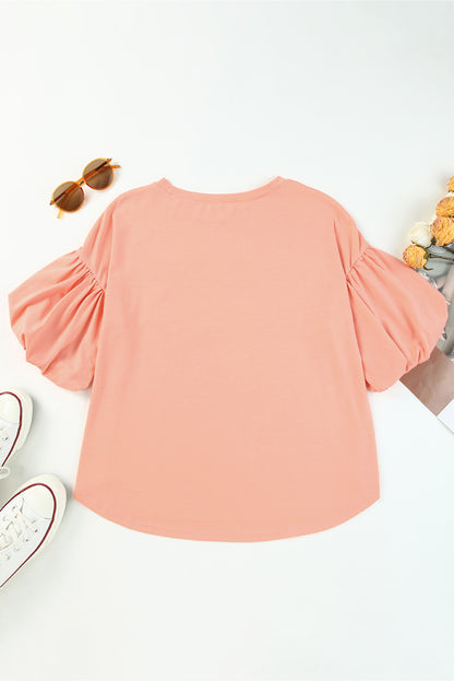 Chemisier à col rond et manches bouffantes 