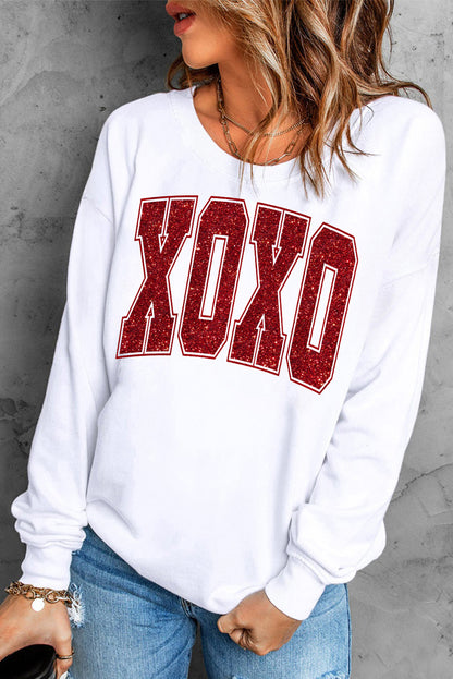 Sweat-shirt ras du cou blanc pailleté XOXO Graphic pour la Saint-Valentin