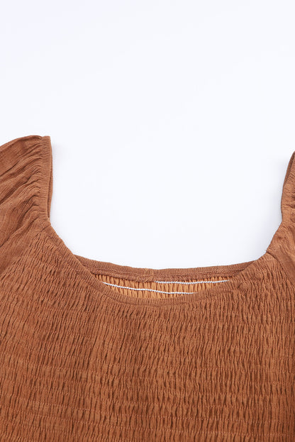 Mini-robe noire à volants et manches évasées 