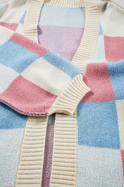 Cardigan ouvert sur le devant à carreaux bleu clair, épaules tombantes et coutures apparentes