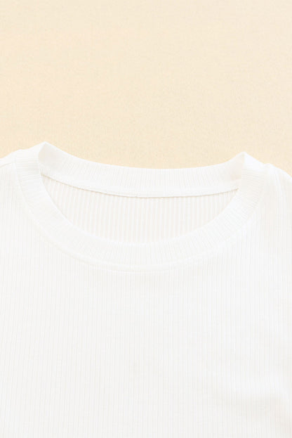 Haut en maille côtelée à volants et manches en maille à pois