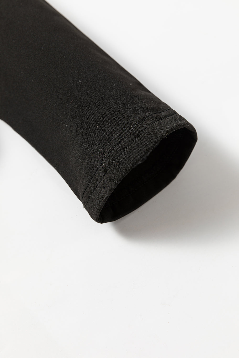 Haut thermique noir uni à col rond et coupe slim