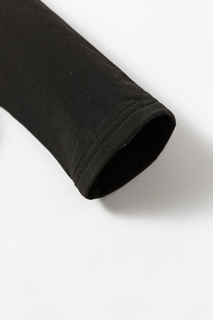 Haut thermique noir uni à col rond et coupe slim