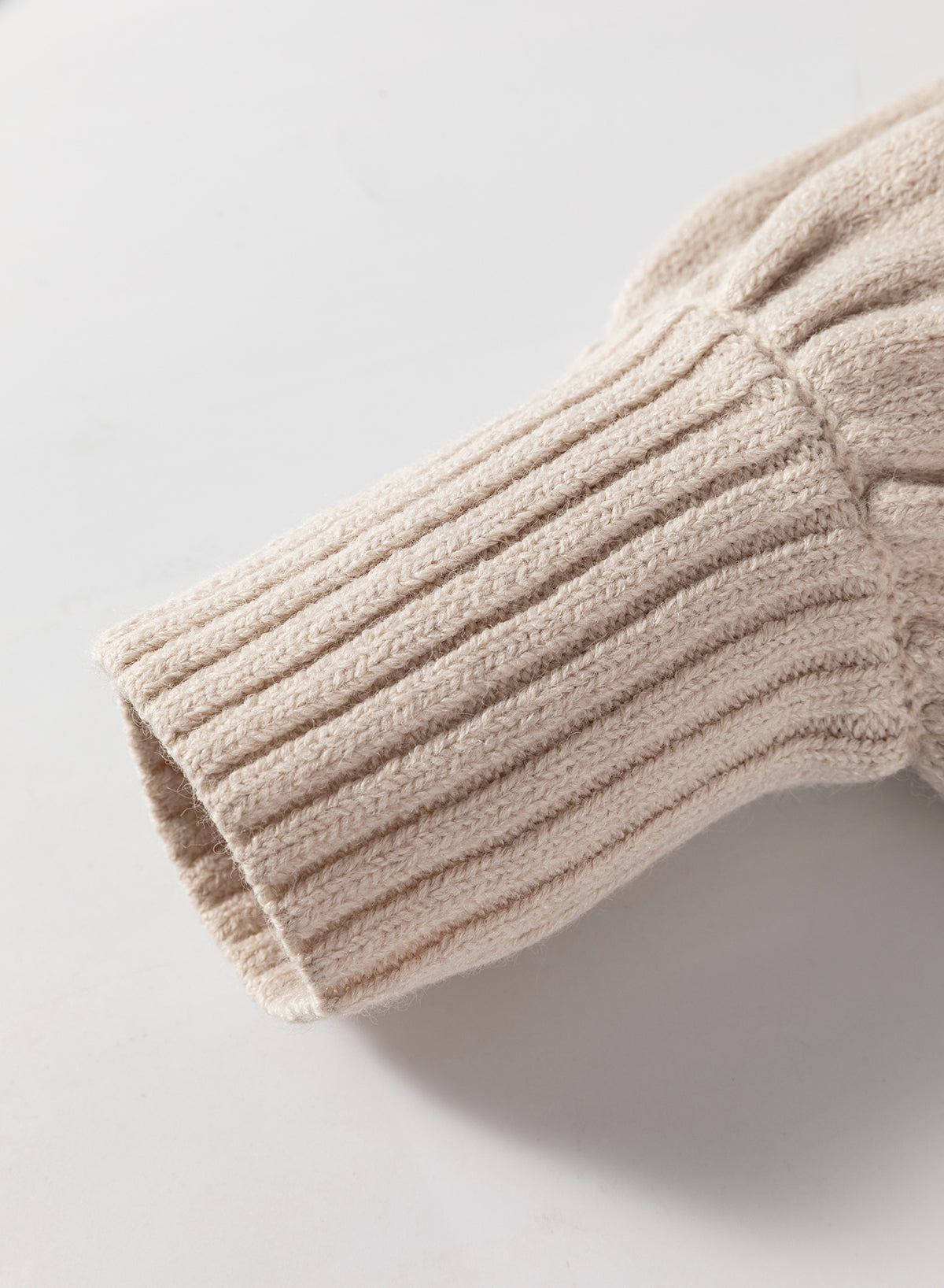 Cardigan long en maille beige ouvert sur le devant avec poches latérales