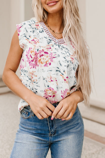 Mono de pierna ancha con tirantes finos florales