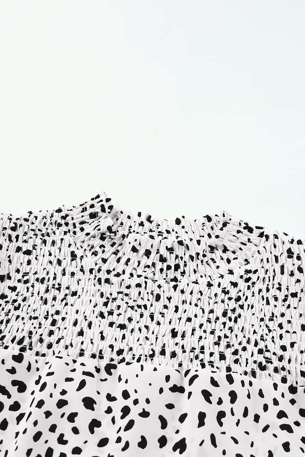 Blusa con mangas abullonadas y detalle fruncido