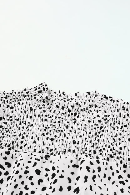 Blusa con mangas abullonadas y detalle fruncido