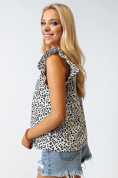 Haut sans manches à col en V et volants sur les épaules 