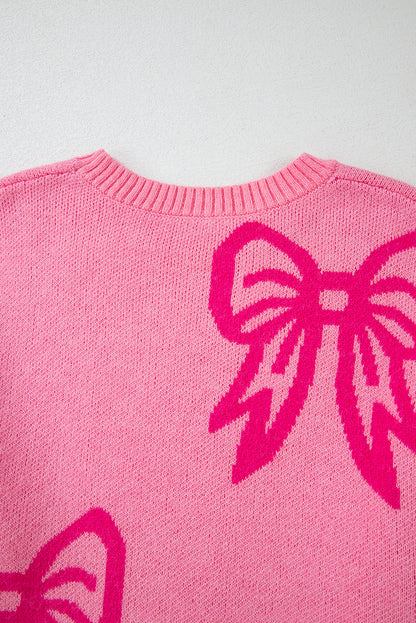Pull ample à épaules tombantes et motif nœud rose