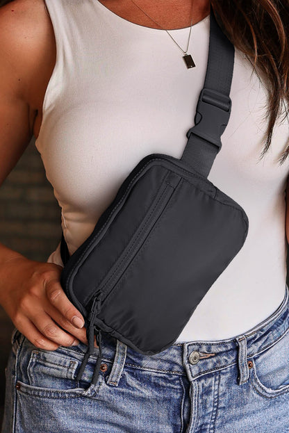 Sac bandoulière carré noir à large ceinture zippée