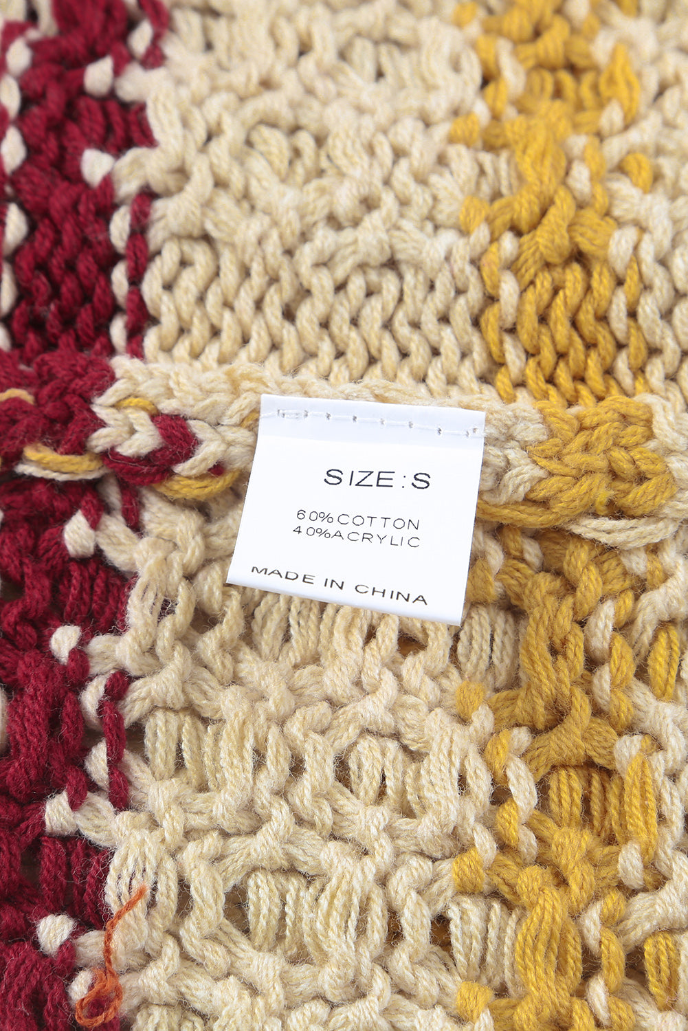 Suéter tipo jersey de punto texturizado con bloques de color a rayas 