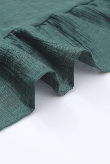 Minivestido negro con cuello cuadrado y manga abullonada