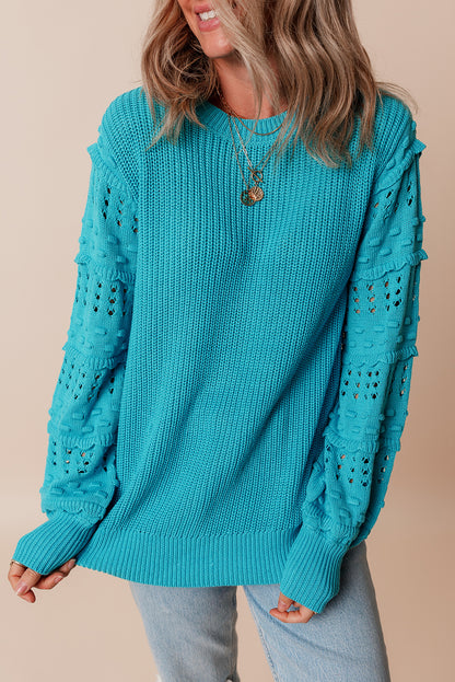 Pull turquoise à volants et manches bouffantes