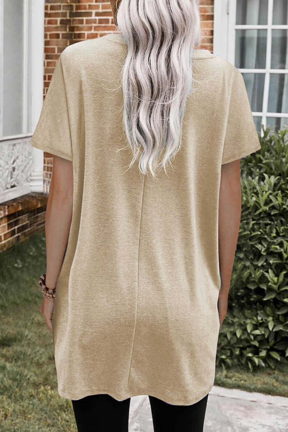 Tunique à manches courtes avec poches latérales 