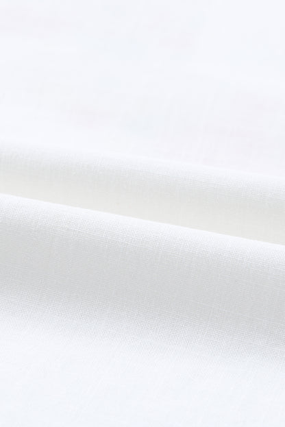 Blusa de manga farol con volantes y bordado floral 