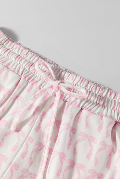 Haut rayé rose à manches 3/4 et épaules tombantes