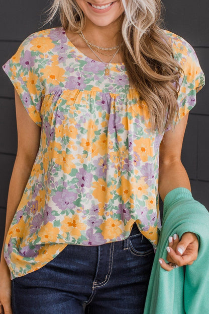 Blusa babydoll de manga corta con abertura en la espalda y estampado floral