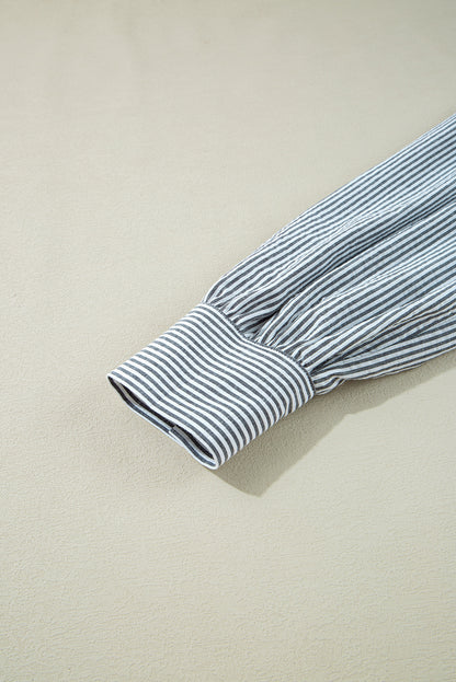 Robe courte noire à rayures et à fleurs, col en V, manches longues