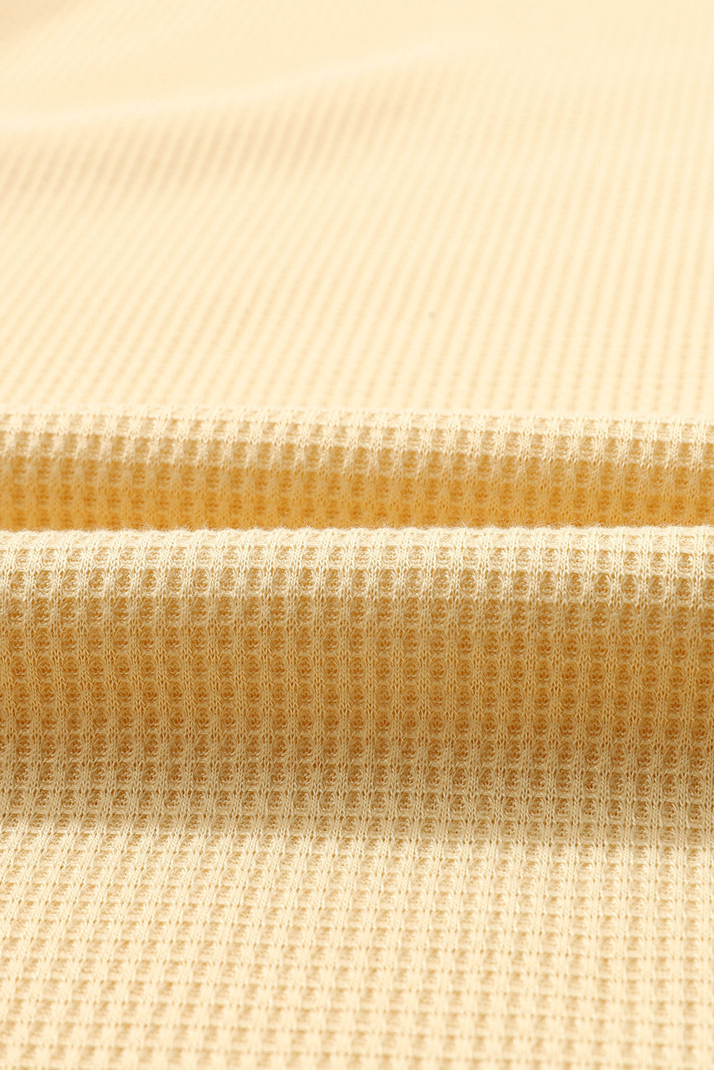 Top de manga larga con botones de punto tipo gofre marrón 